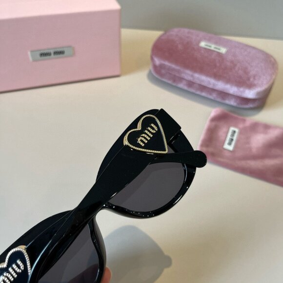 Miu Miu Women\'s Black Sunglasses
